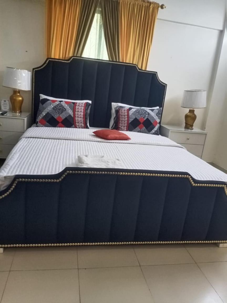 Goho Rooms 10Th Commercial Карачі Номер фото