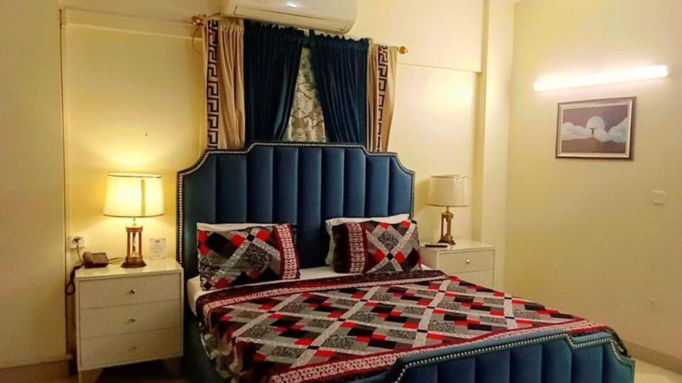 Goho Rooms 10Th Commercial Карачі Номер фото